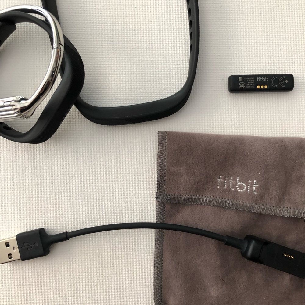 Fitbit Flex 2 with silver bangle and bands